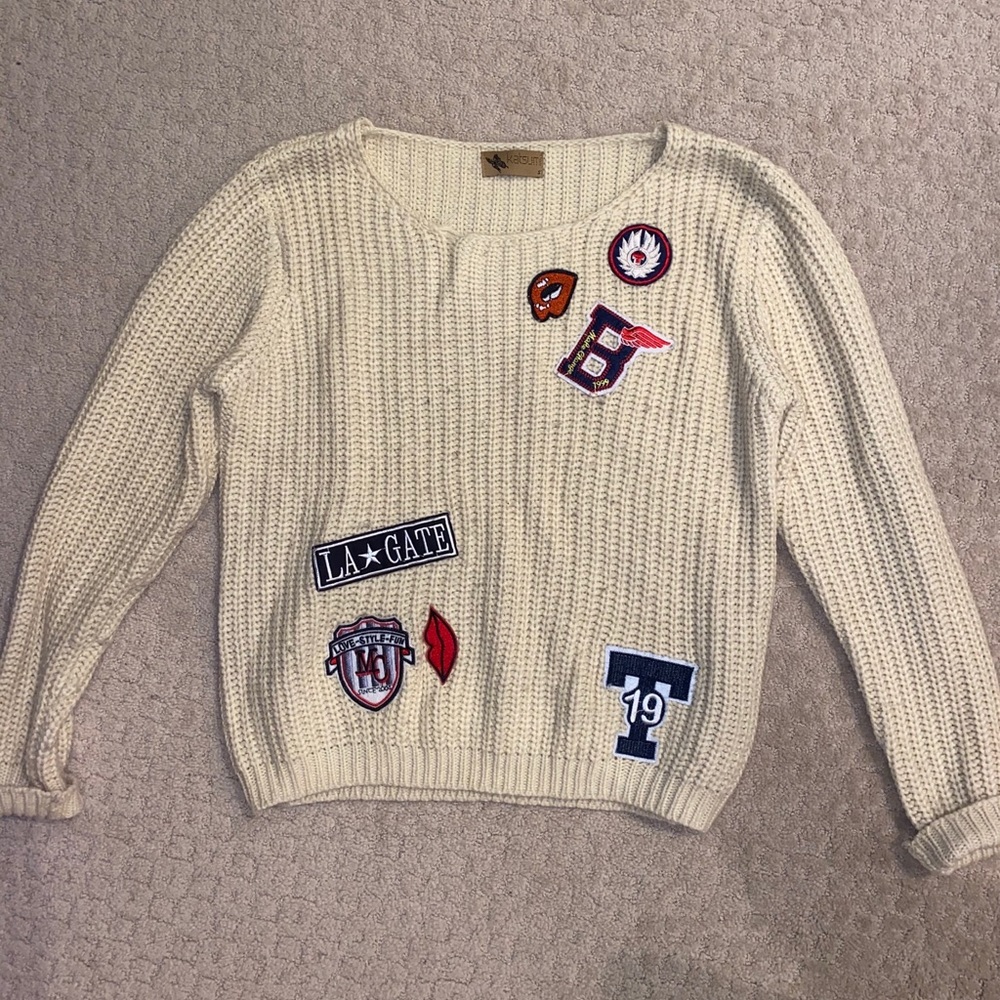 Beige knit sweater with fun patches! Bought at LF